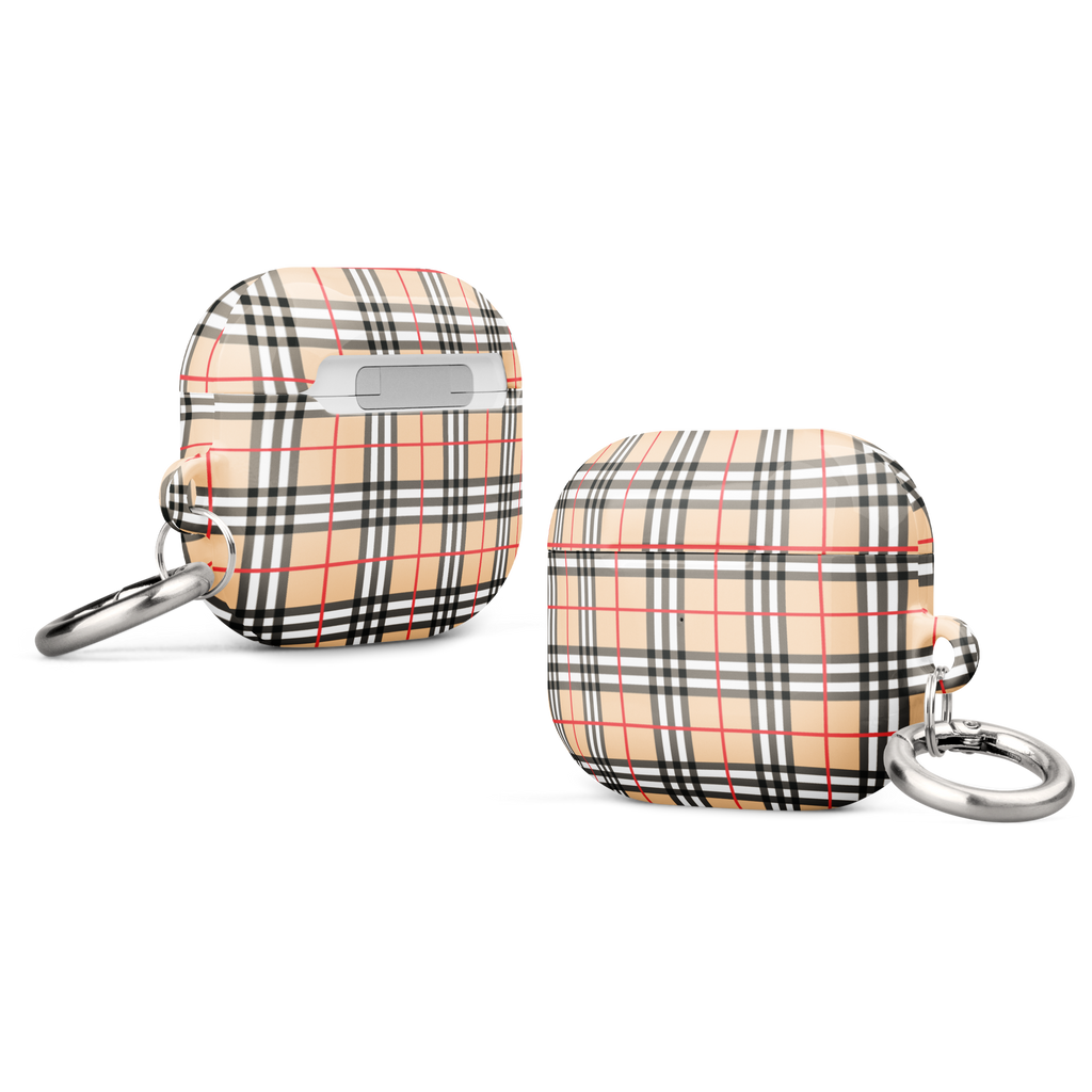 Two protective AirPods case covers with a beige plaid pattern and silver keychain rings, shown from different angles on a white background.