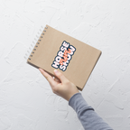 Notebook with 'Horse Show' sticker held by a hand on a light gray background